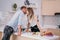 Romantic couple kissing when prepare cooking in the kitchen