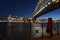 Romantic couple looks at Sydney skyline at dusk