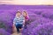 Romantic couple in love in lavender fields in