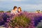 Romantic couple in love in lavender fields in Provence, France