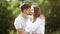 Romantic Couple. Man And Woman Kissing In Nature. Portrait Of Happy Young People