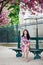 Romantic couple in Paris with cherry blossom trees