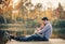 Romantic couple relaxing on the river dock in