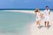 Romantic Couple Running On Beautiful Tropical Beach