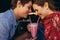 Romantic couple sharing a milkshake