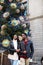 Romantic couple walk on christmas tree background on big square