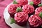 Romantic cupcakes with pink buttercream shaped like a rose