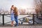 Romantic dating, young couple kissing on the bridge in Paris