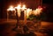 Romantic decoration with candle holders, flowers and candlelights