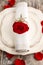 Romantic dinner: napkin ring made with red rose