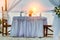 Romantic dinner table on the tropical beach, During sunset, ships in the sea on background