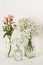 Romantic elegant wedding flowers arrangement on table wall background
