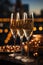 romantic escape in Paris, new year eve wine in the evening, glasses of champagne on Christmas background, glass wine at sunset