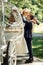 Romantic fairy-tale wedding couple bride and groom kissing in ma