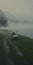 Romantic Golf Cart Driving Through Foggy Fjord - Cinematic Still Shot