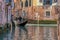 Romantic gondola ride in the canals of Venice, Italy