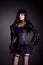 Romantic gothic girl in purple and black outfit