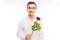 Romantic handsome man holding a red rose