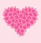 Romantic heart made of pink flowers for Valentine Day