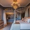 Romantic Hideaway: A master bedroom with soft, dreamy hues, flowing curtains, and a canopy bed adorned with fairy lights The roo