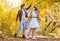 Romantic joyful couple dancing in the middle of forest