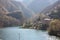 The romantic lake of Isola Santa in Tuscany, in the mountains of the Apuan Alps. panorama out of focus with a bit of mist