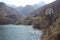 The romantic lake of Isola Santa in Tuscany, in the mountains of the Apuan Alps. panorama out of focus with a bit of mist