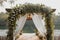 Romantic lakeside affair wedding ceremony adorned with white flowers