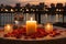 Romantic lakeside restaurant table with wine glass, candles, and rose petals. Romantic setting