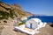 Romantic landscape view of beach with chapel on Amorgos, Greece