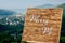 A romantic location in the mountains for a proposal of the hand and the heart Wooden easel with the inscription marry me