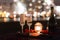 Romantic luxury evening with champagne setting with two glasses, rose petails and candles