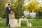 Romantic moments of a young wedding couple on summer meadow