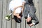 Romantic newlywed couple lying down together in sunny day