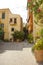 Romantic old courtyard and buildings and cobblestone streets of Crete island, Greece.