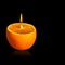 Romantic orange -shaped candle