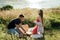 Romantic Picnic Date Ideas. Young couple in love on summer picnic with watermelon.