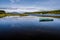 Romantic place by the lake, Mull, Scotland. Green boat.