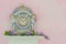 Romantic porcelain clock and Campanula flowers.