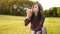 Romantic portrait of young woman with soap balloons.