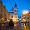 Romantic Prague at night, illuminated church of St. Nicholas with path to Main Town Square with illuminated view of Church St.