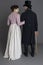 A romantic Regency couple against a grey backdrop