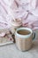 Romantic rich breakfast: oatmeal with berry yogurt and cinnamon, coffee with milk and vintage notebook for records