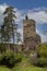 romantic ruins of GutÅ¡tejn Castle are located on a rocky watchtower above the forested valley of the Hadovka