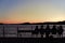 Romantic scene of sunset watching on the lake coast