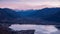 Romantic scenic view of the sunrise at Iseo Lake with alps in the background