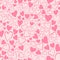 Romantic seamless pattern with cute images of hearts on a pink background. The style of children`s drawing.