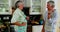 Romantic senior couple dancing in kitchen 4k