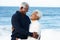 Romantic Senior Couple Hugging On Beach