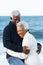 Romantic Senior Couple Hugging On Beach